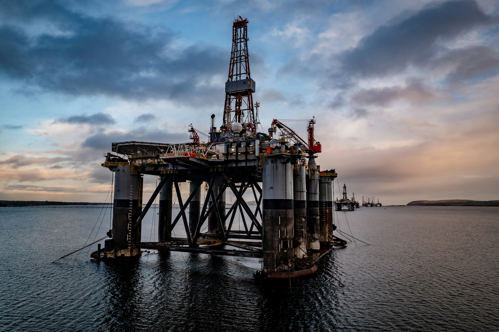 Close Up Aerial View of an Oil and Gas Drilling Rig at Night