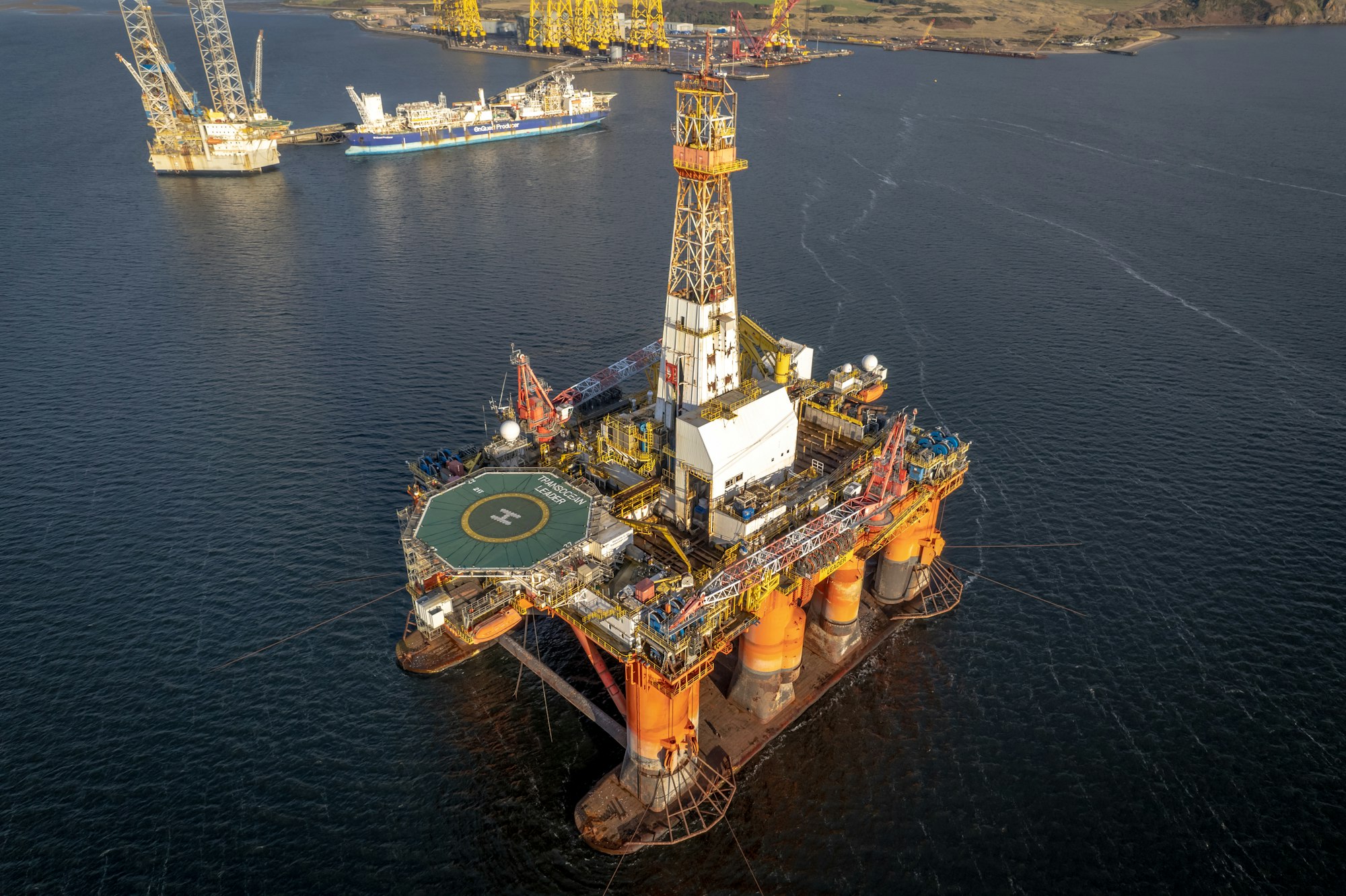 Oil and Gas Drilling Platform at Sea at Sunset